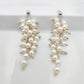 Dangle white bridal earrings with pearls