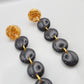 Dangle black earrings on gold studs