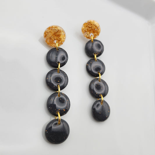 Dangle black earrings on gold studs