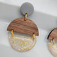 Dangle wood semicircles and transparent with gold shimmer earrings