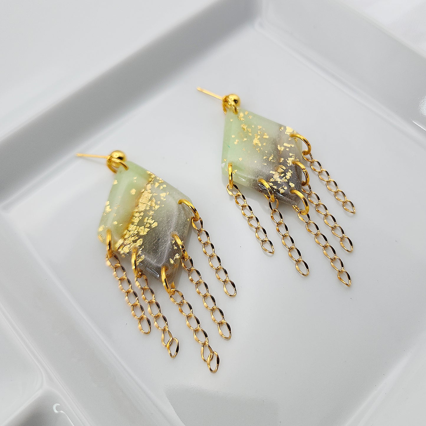 Long green drop chandelier earrings with gold fringes