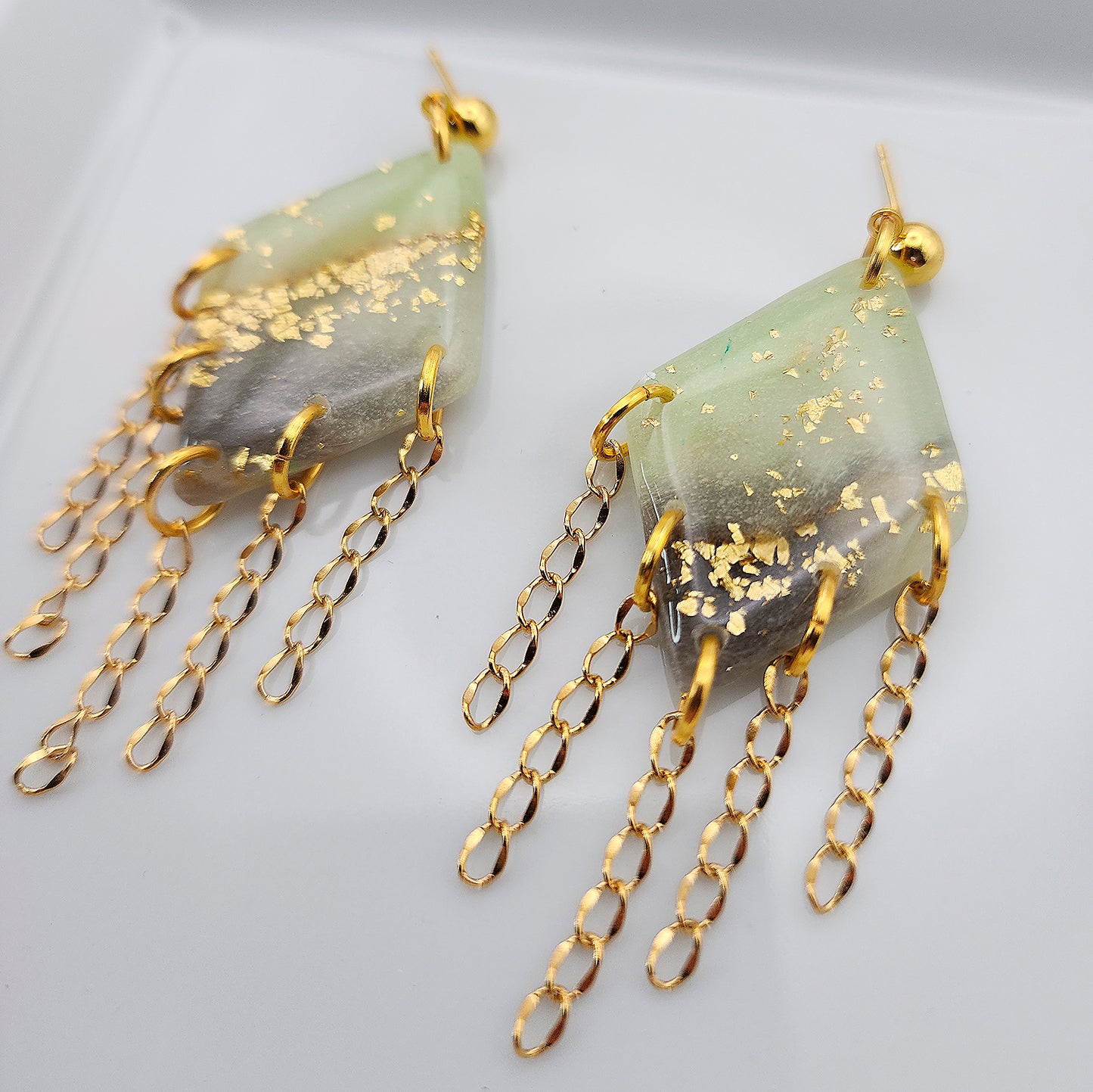 Long green drop chandelier earrings with gold fringes