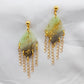 Long green drop chandelier earrings with gold fringes