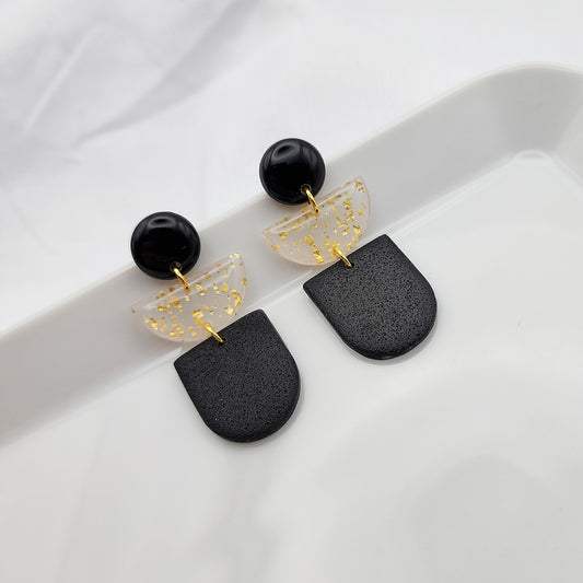 Dangle black earrings with semicircle with gold foil