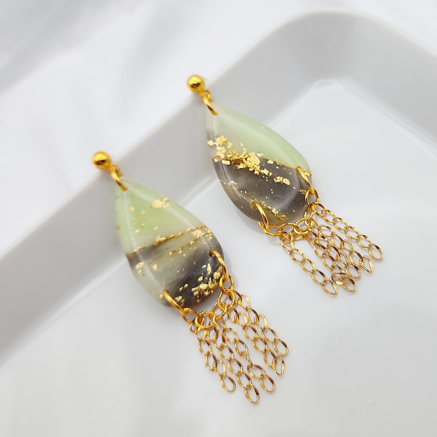 Long green drop chandelier earrings with gold fringes