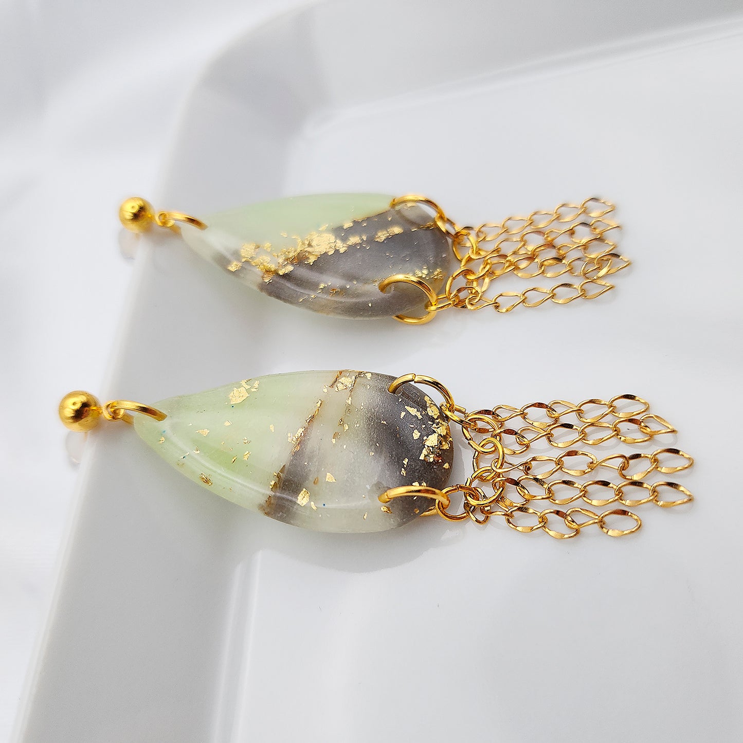 Long green drop chandelier earrings with gold fringes