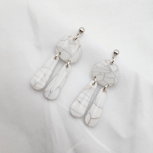 Long drop chandelier earrings with fringes