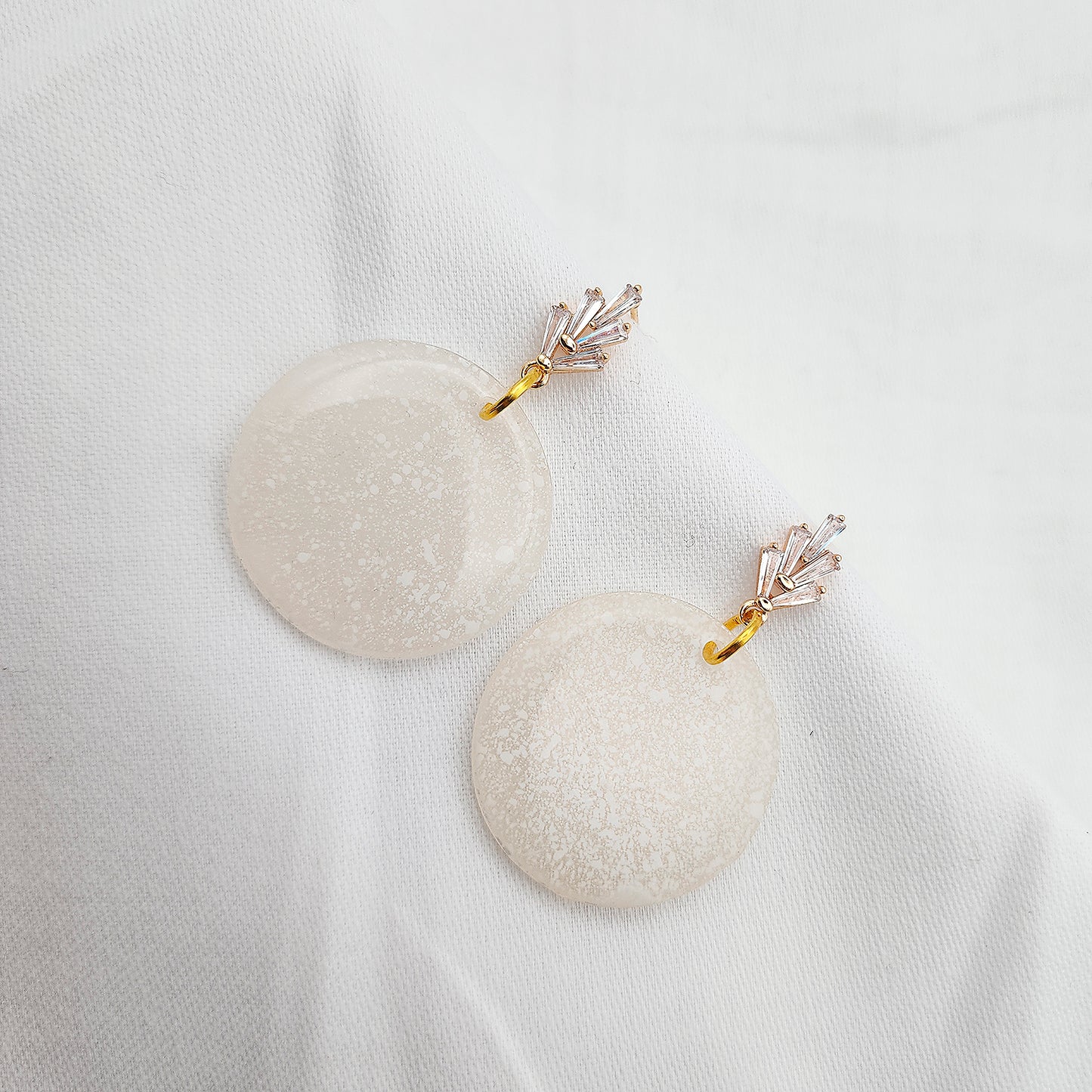 Hoop earrings white color on gold studs