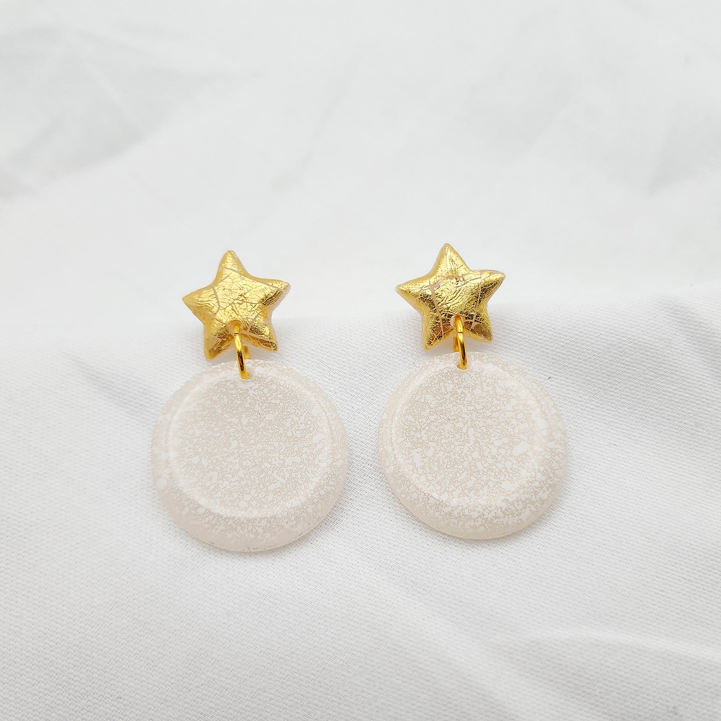 Hoop earrings white color on stars studs