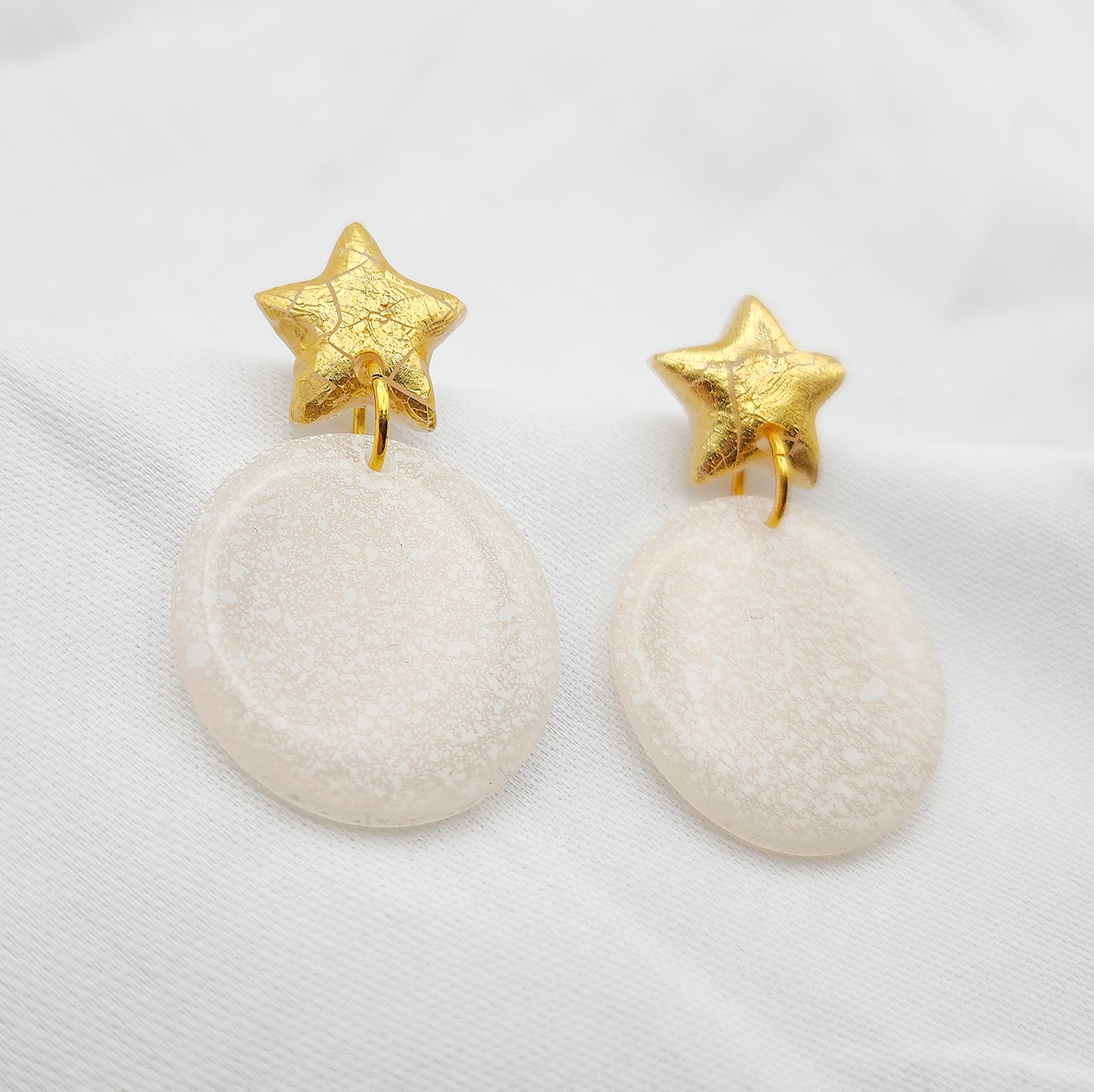 Hoop earrings white color on stars studs