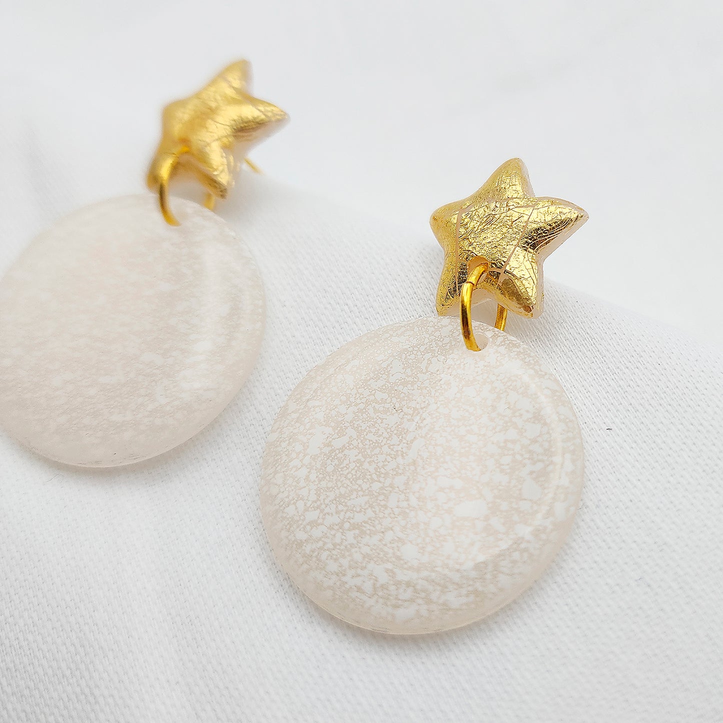 Hoop earrings white color on stars studs