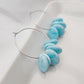 Hoop earrings with blue beads