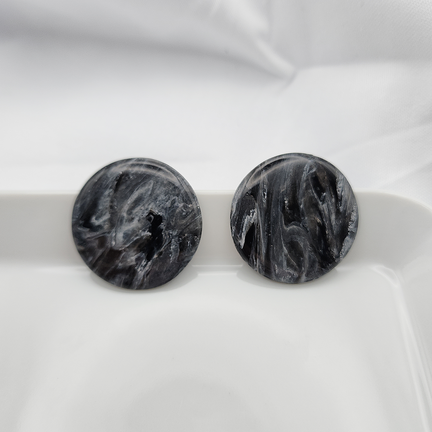 Round large black statement stud earrings