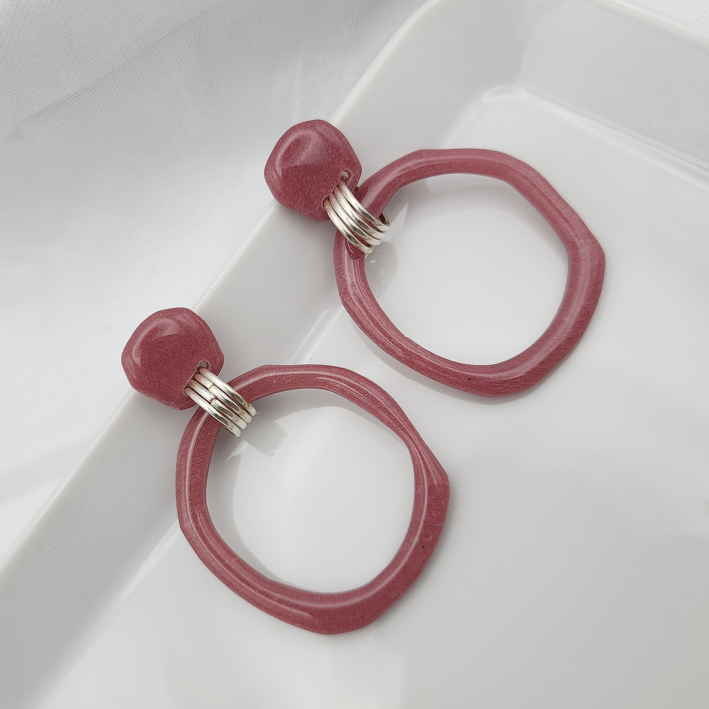 Statement dangling burgundy hoop earrings