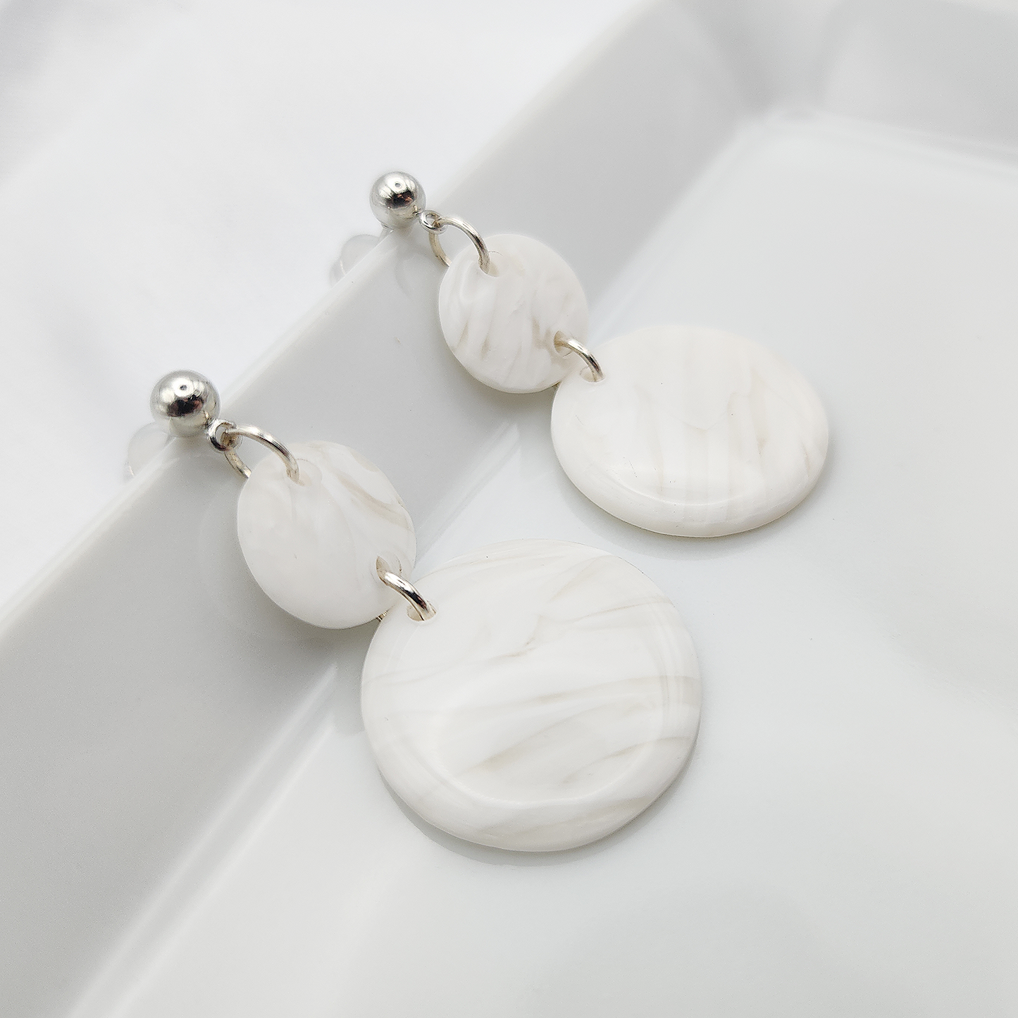 Round geometric ivory dangle earrings