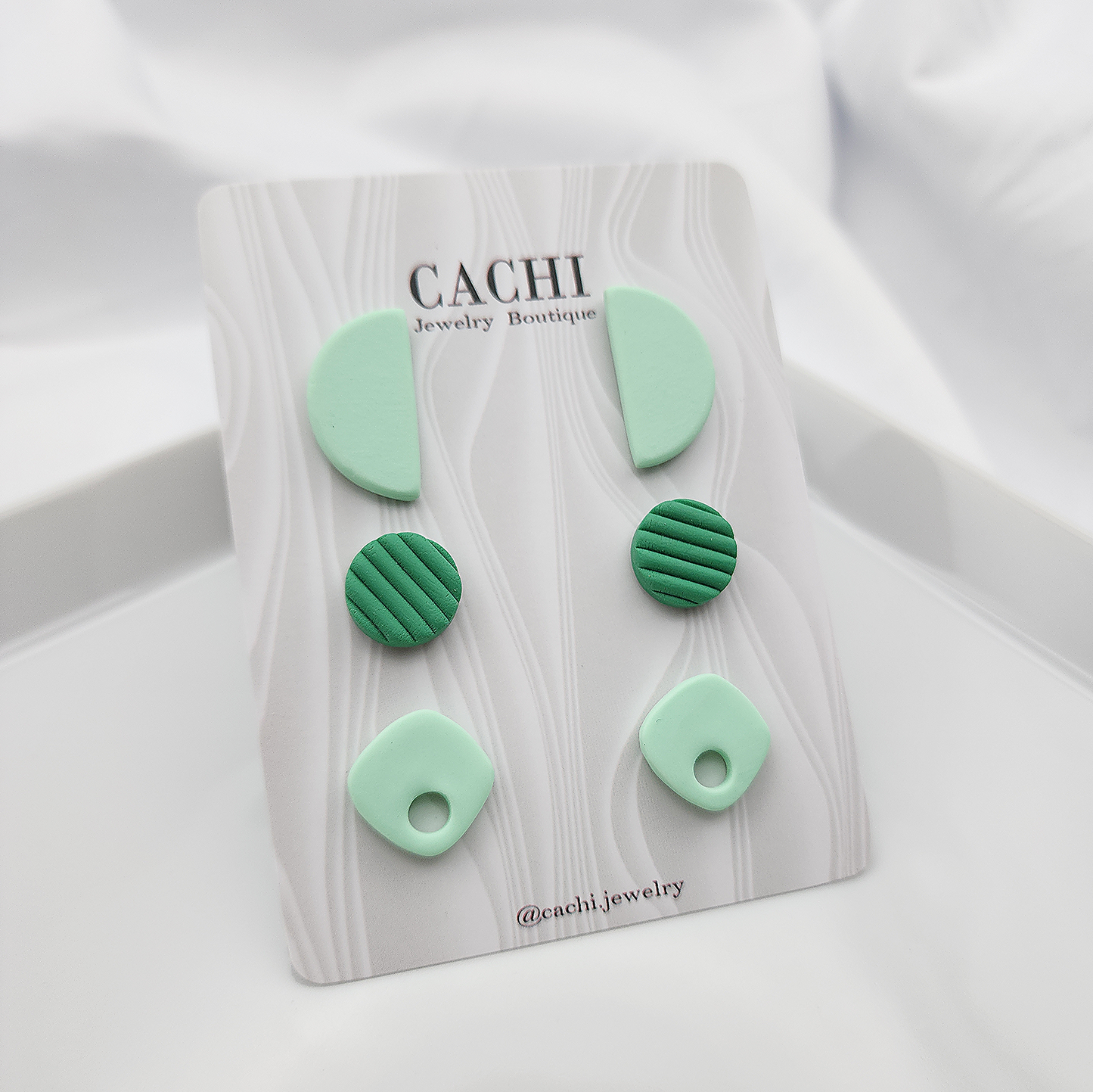 Set of green stud earrings