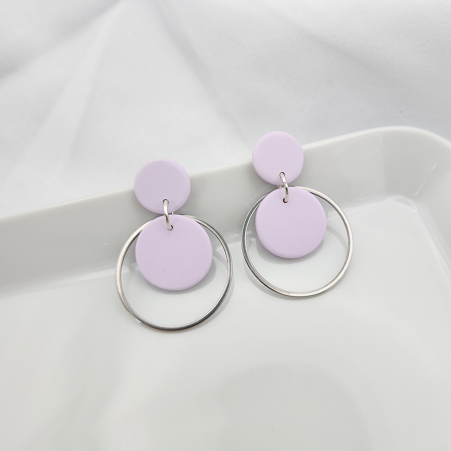 Round light purple dangle earrings