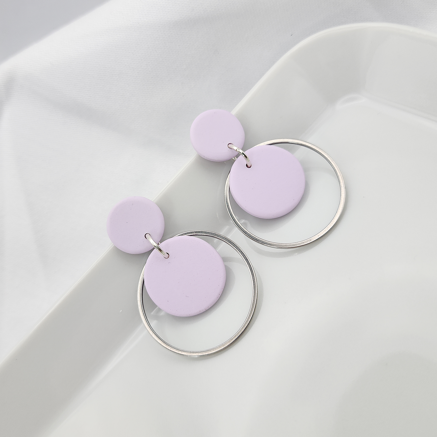 Round light purple dangle earrings