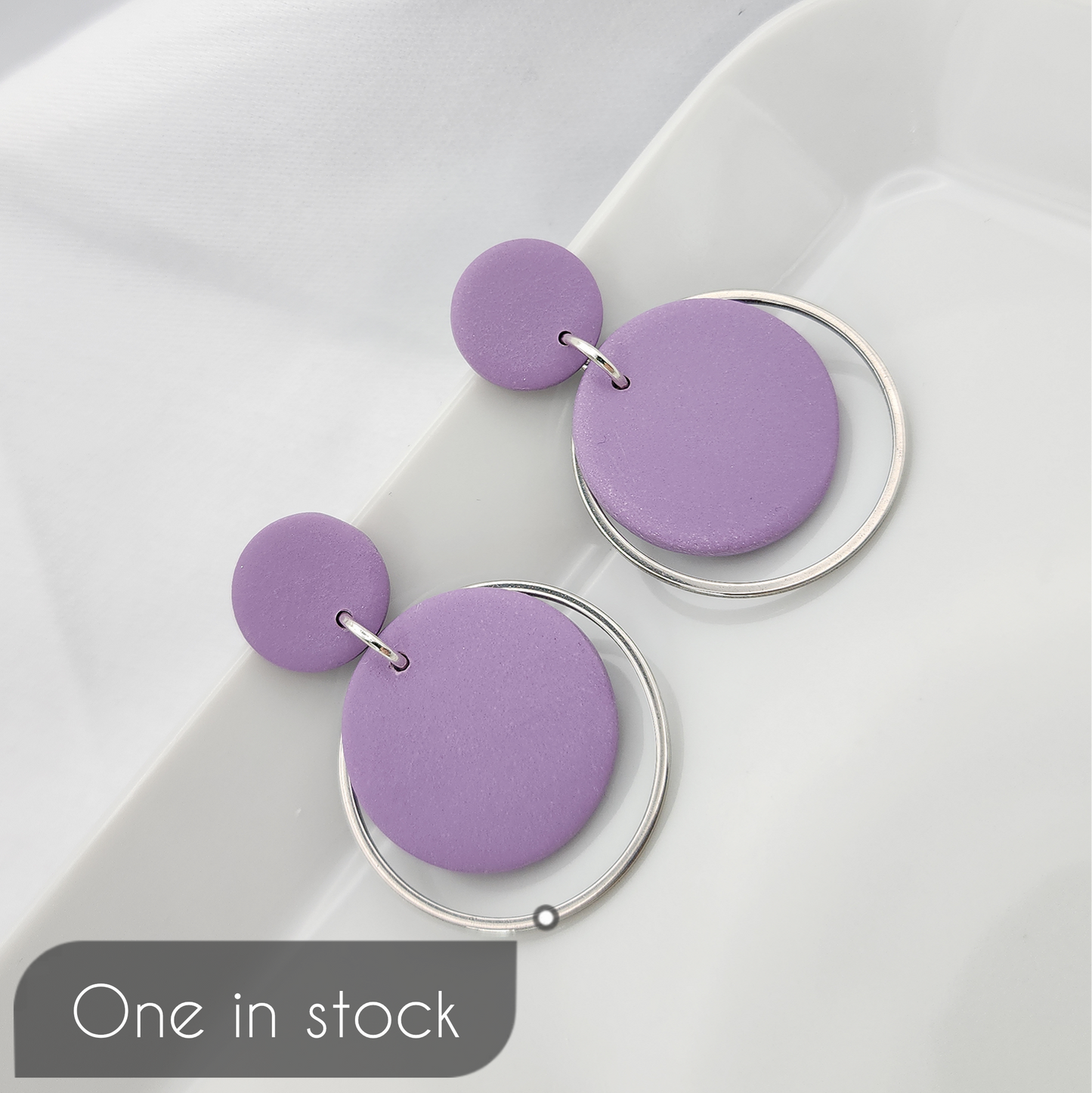 Round purple dangle earrings