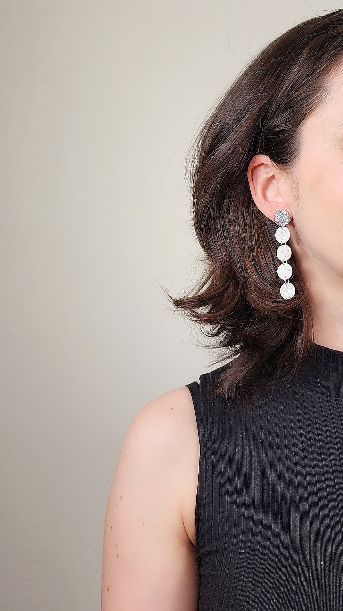 Dangle white earrings on silver studs