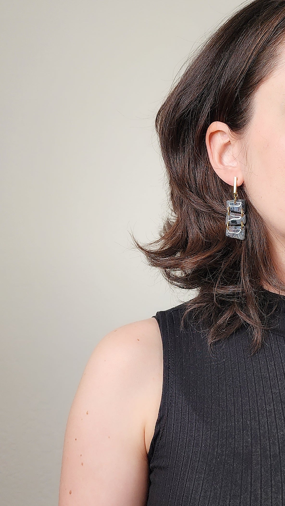 Oblong black dangle earrings